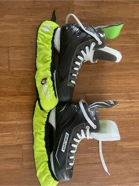 Bauer Black Hockey Skates with Neon Green Blade Covers